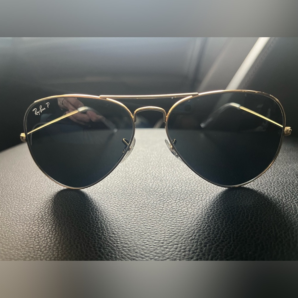 Ray Ban Classic aviator. Gold frame, black lenses.